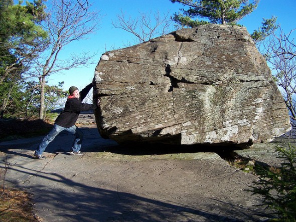 pushing a boulder